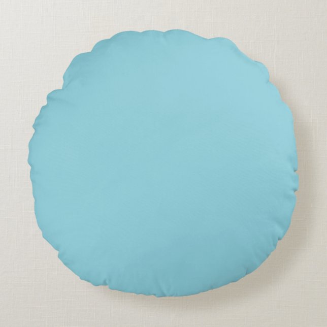 rounded cloud-like shape on light grey round pillow (Front)