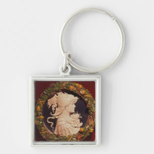 Roundel bearing a profile portrait keychain