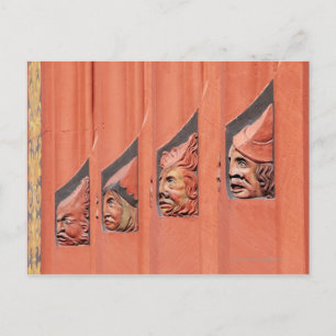 Row of ceramic heads along Basel's 16th Century Postcard
