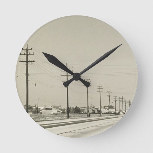 Row of Electricity Poles Round Clock (Front)