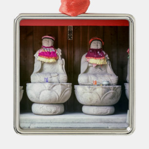 Row of Jizo monk statues with bib and hat - Japan Metal Ornament