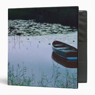 Rowboat on small lake surrounded by water binder
