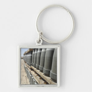 Rows of ammunition are stacked and prepped keychain
