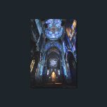 Ruined Cathedral Stained Glass Projection Glow Canvas Print<br><div class="desc">An abandoned gothic cathedral interior is dramatically illuminated by projected stained-glass light pouring from a massive rose window high above. Intense beams of sapphire blue, emerald green, ruby red, amethyst purple, and golden yellow cascade across crumbling arches, shattered stone, and the central altar, transforming decay into transcendent beauty. The interplay...</div>