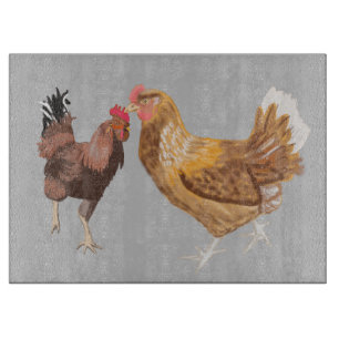Running rooster and brown hen  cutting board