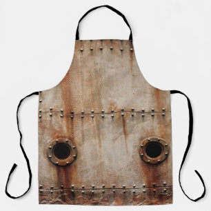 RUST AND TEXTURE ON METAL PLATE SIDES OF STAGED SH APRON