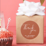 Rust Terracotta Boho Wedding Thank You Classic Round Sticker<br><div class="desc">Wedding favour stickers in a terracotta or rust colour with white text. Say thank you to your wedding guests with these personalized wedding stickers in a gorgeous script font that read: Thank you. Personalize with your names and wedding date.</div>