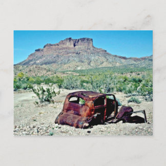 Rusted Antique Car In Front Of Butte Postcard