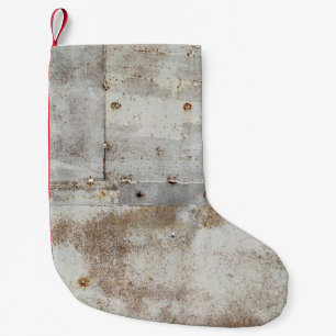 Rusted colourful metal wall, streaks. small christmas stocking