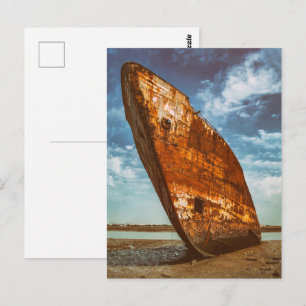Rusted Shipwreck beached or stranded on a beach Postcard