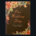 Rustic Autumn Fall Leaves Wedding planner Notebook<br><div class="desc">Pretty wedding planner with autumn fall leaves in orange,  yellow and green. Perfect for an autumn fall wedding. The words can be changed to suit your own details or requirements.</div>