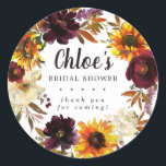 Rustic Autumn Floral Bridal Shower Thank You Classic Round Sticker<br><div class="desc">Dramatic fall flowers include yellow sunflowers, purple peonies, dark red roses, and ivory white hydrangeas. They are nestled in fall leaves and vines to create a very pretty wreath. The bride's name is written in a large script font. Bridal Shower and the thank you sentiment follow. This bridal shower sticker...</div>