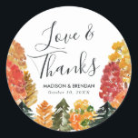 Rustic Autumn Forest Fall Wedding Classic Round Sticker<br><div class="desc">Add a personalized touch to your favour bags with our Rustic Autumn Forest wedding stickers. The personalized wedding stickers feature the phrase "Love & Thanks" in an elegant calligraphy font, your names, and wedding date framed by a border watercolor trees in shades of yellow, orange, burgundy, rust, and green. Designed...</div>