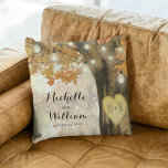 Rustic Autumn Tree Monogram Newlywed Couple Throw Pillow<br><div class="desc">Autumn woodland newlywed pillow featuring a rustic fall tree covered in red, orange and yellow leaves, a carved heart with their initials, string twinkle lights and a modern text template. For further customization, please click the "Personalize it" button to modify this template. All text style, colours, and sizes can be...</div>