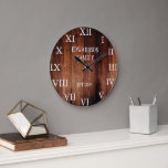 Rustic barn wood family name country large clock<br><div class="desc">Rustic,  dark barn wood wall clock with large Roman numbers.
You can personalize and add your own name and year established.</div>