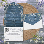 Rustic Blue Wood Floral Greenery QR Code Wedding All In One Invitation<br><div class="desc">An all-in-one wedding invitation features a beautiful floral greenery cascade,  elegant typography,  and monogram initials on a background of rustic blue barn wood panels. The invitation includes a perforated RSVP card with your wedding website QR code and details. Designed by Thisisnotme©</div>