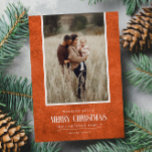 Rustic Burnt Orange Winter Christmas Single Photo Holiday Card<br><div class="desc">This simple and rustic holiday design features your best portrait photo over a rustic paper texture in Burnt Orange colour and the word "Merry Christmas" in vintage script text . Perfect for farmhouse style greeting cards. Easily add your best photo, your family names and year using the template. Add a...</div>