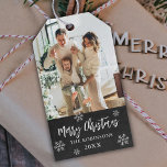 Rustic Chalkboard Snowflake Photo Christmas  Gift Tags<br><div class="desc">Rustic Chalkboard Snowflakes Family Photo Christmas Gift Tags. Featuring a single photo with 'Merry Christmas' calligraphy and family name and year on black chalkboard background. The rustic snowy, minimalist design adds a touch of sophistication to your holiday gifts, ensuring they stand out this season! The displayed family photo is for...</div>