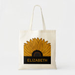 .Rustic Country Burlap Sunflower Wedding Favours Tote Bag<br><div class="desc">Wedding favours design featuring a graphically created sunflower on a burlap background utilizing the colours of multi-tonal golden yellow,  rust and black with the burlap background being a khaki tone.</div>