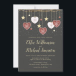 Rustic Country Heart Winter Wedding Invitation<br><div class="desc">Red and white Folk Art hearts with snowflakes create a beautiful border on the top of this rustic wedding invitation. The hearts along with gold stars dangle from a grapevine branch. They really pop against the black background that is dappled with tiny snowflakes. Light gold text also shows up against...</div>