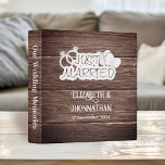 Rustic Country Wood Just Married Wedding Planners Binder<br><div class="desc">Unveil the magic of your love story with our Rustic Country Wood Just Married Wedding Planner 3 Ring Binder! The rustic wood texture provides a charming backdrop, complemented by a white 'Just Married' logo featuring hearts and wedding rings. Below, personalize the binder with the names of the bride and groom,...</div>