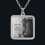 Rustic Cowboy Boots Country Western Wedding Silver Plated Necklace<br><div class="desc">The charming Rustic Cowboy Boots Country Western Wedding Pendant Necklace makes a unique personalized keepsake wedding gift for the bride or her bridesmaids. This ranch theme custom country chic wedding necklace features a black and white digitally enhanced photograph of leather cowboy boots with a weathered barn wood background inside a...</div>