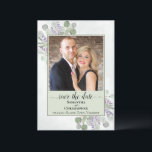 Rustic Eucalyptus & Lavender Green Wedding Photo Save The Date<br><div class="desc">This wedding save the date card is simple, rustic, elegant, and beautiful. It features your photo in a light sage green coloured frame surrounded by a bevy of hand painted watercolor eucalyptus leaves and lavender flowers on a marbled pale steel blue background. The title reads: Save the Date in lacy...</div>
