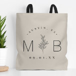 Rustic Floral Stem Wedding Monogram | Light Beige Tote Bag<br><div class="desc">Custom printed tote bags make a fun and functional wedding favour your guests will love! Personalize the template with the bride and groom's names or monogram initials. Add your wedding date, the city, state or venue name or any other custom text. This modern rustic logo-style design has a simple floral...</div>