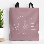 Rustic Floral Stem Wedding Monogram | Mauve Tote Bag<br><div class="desc">Custom printed tote bags make a fun and functional wedding favour your guests will love! Personalize the template with the bride and groom's names or monogram initials. Add your wedding date, the city, state or venue name or any other custom text. This modern rustic logo-style design has a simple floral...</div>