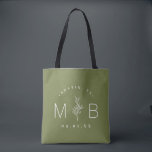 Rustic Floral Stem Wedding Monogram | Olive Green Tote Bag<br><div class="desc">Custom printed tote bags make a fun and functional wedding favour your guests will love! Personalize the template with the bride and groom's names or monogram initials. Add your wedding date, the city, state or venue name or any other custom text. This modern rustic logo-style design has a simple floral...</div>