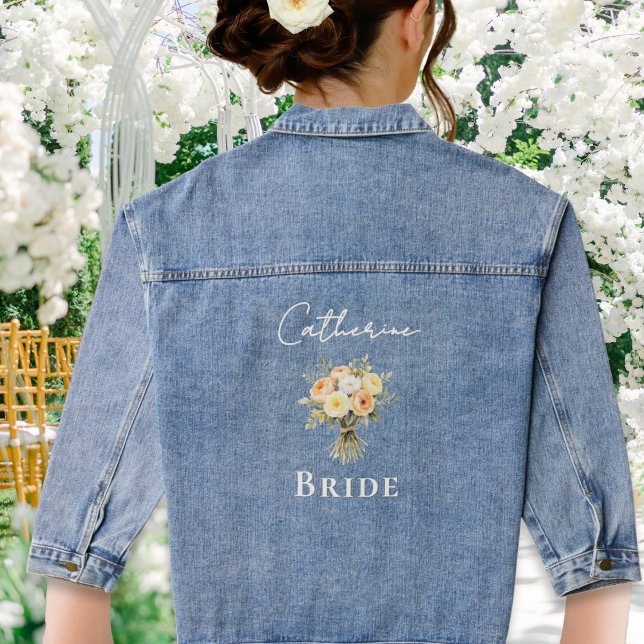 Rustic Floral Wedding Personalized Bride Denim Jacket (A denim jacket for a bride, with peach, yellow and white roses and custom name in script typoography)