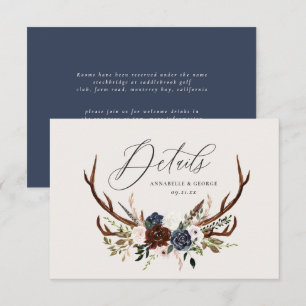 Rustic foliage, floral and stag wedding details save the date