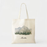 Rustic Forest and Mountain Birdesmaid Tote Bag<br><div class="desc">This design captures the enchanting beauty of a rustic forest and mountain landscape through delicate watercolor strokes. The earthy tones and natural textures evoke a sense of tranquillity and connection with nature. The serene depiction of trees, mountains, and wilderness brings a touch of rustic charm to any project. Whether used...</div>