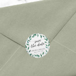 Rustic Greenery Save the Date Classic Round Sticker<br><div class="desc">This rustic Save the Date sticker featuring Italian Ruscus with the words "save the date" in trendy script all against a pale wood background. Personalize this by replacing the placeholder text in the template to add your information. For more options such as to change the font and it's size/colour or...</div>