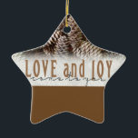 Rustic Holiday Love and Joy Pine Cone Ceramic Ornament<br><div class="desc">Festive,  rustic pine cones accentuate this classic,  elegant design wishing holiday Love and Joy.</div>