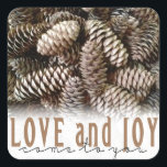 Rustic Holiday Love and Joy Pine Cone Square Sticker<br><div class="desc">Festive, rustic pine cones accentuate this classic, elegant design wishing holiday Love and Joy.</div>