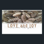 Rustic Holiday Love and Joy Pine Cone Sticker<br><div class="desc">Festive,  rustic pine cones accentuate this classic,  elegant design wishing holiday Love and Joy.</div>