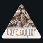Rustic Holiday Love and Joy Pine Cone Triangle Sticker<br><div class="desc">Festive,  rustic pine cones accentuate this classic,  elegant design wishing holiday Love and Joy.</div>