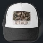 Rustic Holiday Love and Joy Pine Cone Trucker Hat<br><div class="desc">Festive, rustic pine cones accentuate this classic, elegant design wishing holiday Love and Joy.</div>