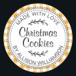 Rustic Homemade Christmas Cookies Yellow Check Classic Round Sticker<br><div class="desc">Rustic, modern and simple homemade baked goods apple pie sticker with the text made with love, Christmas cookies and your name in elegant handwritten script calligraphy and typography on a mellow yellow check pattern background with a stylish touch of foliage. Simply add your name and the product name to the...</div>