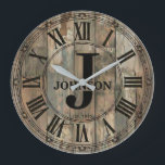 Rustic Johnson Family Clock | Farmhouse Decor<br><div class="desc">Celebrate the Johnson family legacy with this stunning rustic monogram wall clock that brings timeless elegance to any home. 🕰️ Featuring a weathered wood-look background with vertical planks, a decorative ornate border, and Roman numerals framing a classic monogram design with a large J initial, the Johnson family name in bold...</div>