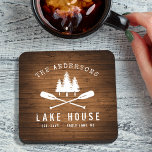 Rustic Lake House Boat Oars Trees Wood Print Coaster<br><div class="desc">Beautiful, rustic themed cork back coasters, featuring your family name and "Lake House" or other desired text along with its established date and location. This custom, unique design features a white silhouette of crossed boat oars and pine trees on a print of rich coloured wood planks. To see more designs...</div>