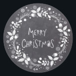 Rustic Merry Christmas Floral Wreath Chalkboard Classic Round Sticker<br><div class="desc">This holidays design features a rustic grey chalkboard with an elegant white floral wreath and the text "Merry Christmas" in hand lettered script in the centre. #christmas #holidays #seasonal #festive #rustic #floral #elegant #stylish #modern #trendy #flowers #grey #grey #white #flowers #holly #country #script #text #design #designer #trending #popular #labels #stickers...</div>