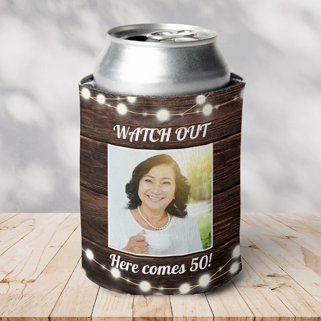 Rustic Modern Custom Photo 50th Birthday Stylish Can Cooler (a wooden-patterned koozie with "Watch Out Here comes 50!" text. Features a Photo and string lights )