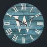 Rustic Monogram Driftwood Custom Family Name Large Clock<br><div class="desc">Personalized Family Name, monogram, and year established Rustic Modern Wall clock in a trendy farmhouse style design with roman numeral clock face and turquoise grey driftwood plank / shiplap backdrop design. Perfect gift for newlyweds, wedding or housewarming present or grandparents gift, or for a home make-over in your beach cabin,...</div>
