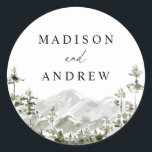 Rustic Mountain Evergreen Forest Wedding Classic Round Sticker<br><div class="desc">Rustic wedding stickers featuring a landscape of watercolor evergreen trees and mountains. Personalize the woodland mountain wedding stickers with your names and wedding details. The woodland wedding stickers are perfect for sealing wedding envelopes, wedding favour bags, and more! The forest wedding invitations are perfect for destination weddings in the mountains....</div>