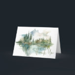 Rustic Mountain Lake Scene Watercolor Folded Thank You Card<br><div class="desc">Escape to a serene mountain retreat with your folded wedding thank you card. This exquisite design showcases a breathtaking watercolor painting of a majestic mountain, its slopes draped in lush pine trees, mirroring their beauty in the crystal-clear waters below. The muted natural tones of tan, greens, teal blues, and greys...</div>