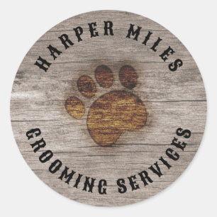 rustic paw print burnt on wood western-style classic round sticker
