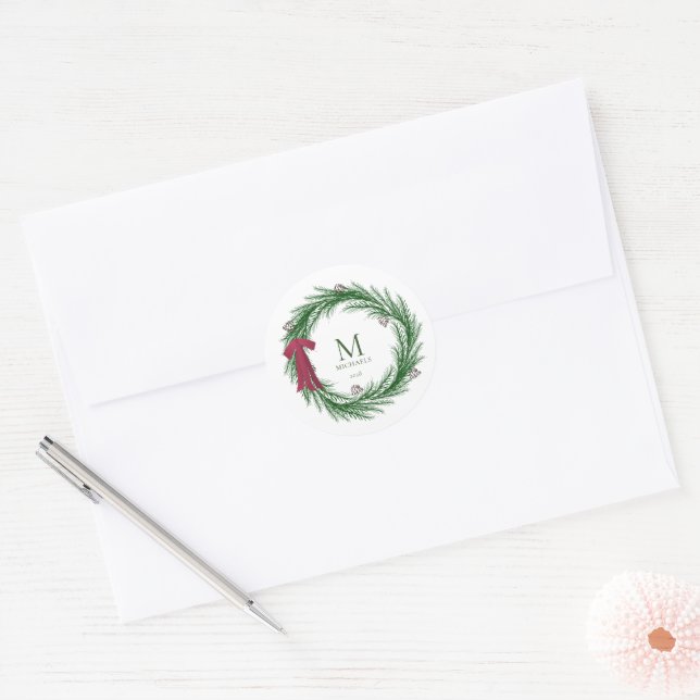 Rustic Pine Holiday Wreath Monogram Family Name Classic Round Sticker (Envelope)