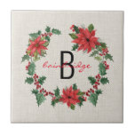 Rustic Poinsettia & Holly Wreath Monogrammed Tile<br><div class="desc">A festive,  poinsettia and holly Christmas wreath surrounds initial and name on this rustic,  tile. You can easily personalize your tile using Zazzle's easy to use design tool. Background is a simple,  natural burlap. Makes a very thoughtful Gift. Part of a collection.</div>